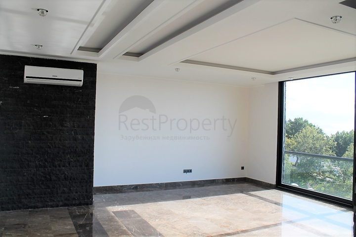 Апартаменты с завораживающим видом в центре Алании