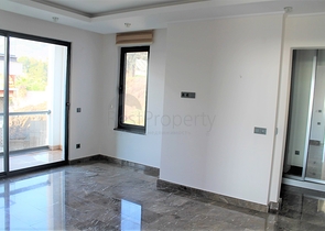 Апартаменты с завораживающим видом в центре Алании