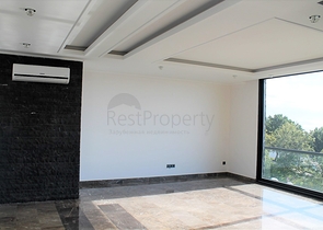 Апартаменты с завораживающим видом в центре Алании