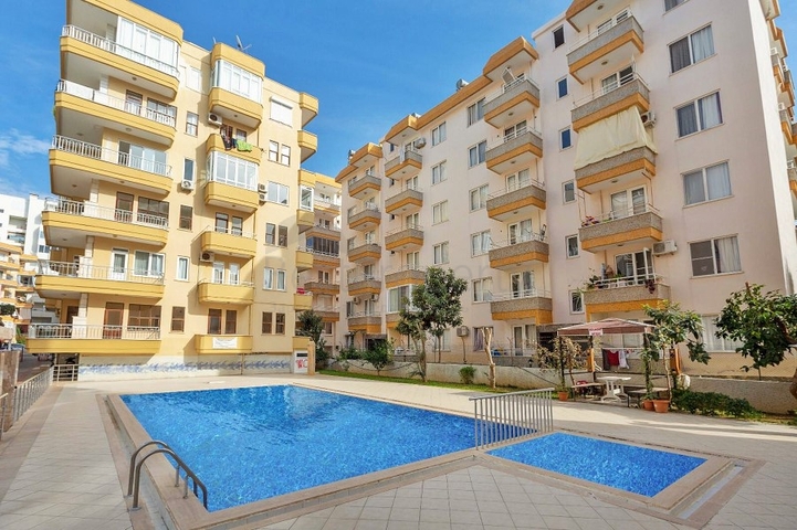 Квартира с отдельной кухней в Махмутларе