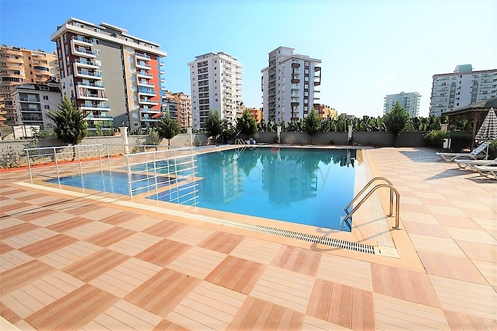 Двухуровневые апартаменты 4+1 в Махмутларе