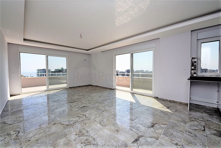 Двухуровневые апартаменты 4+1 в Махмутларе