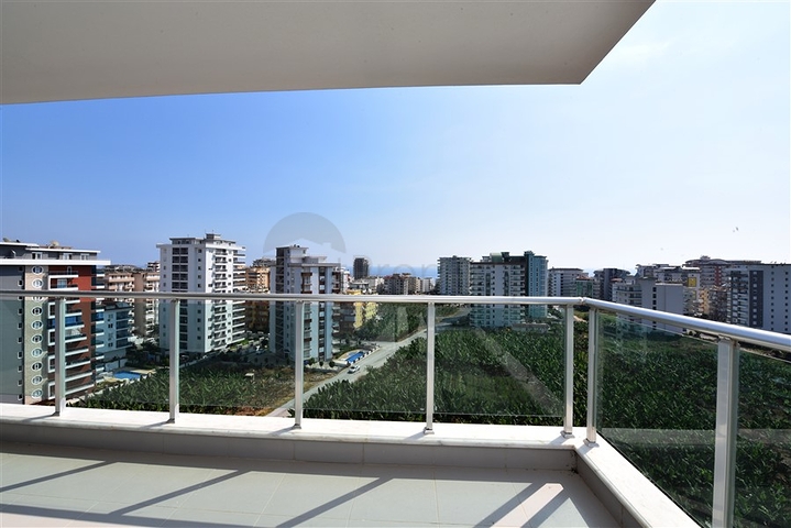 Двухуровневые апартаменты 4+1 в Махмутларе