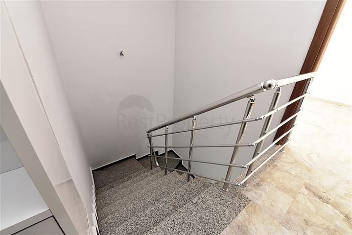 Двухуровневые апартаменты 4+1 в Махмутларе