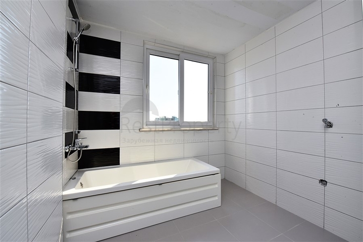 Двухуровневые апартаменты 4+1 в Махмутларе