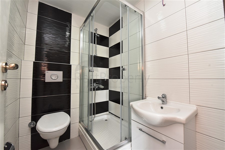 Двухуровневые апартаменты 4+1 в Махмутларе