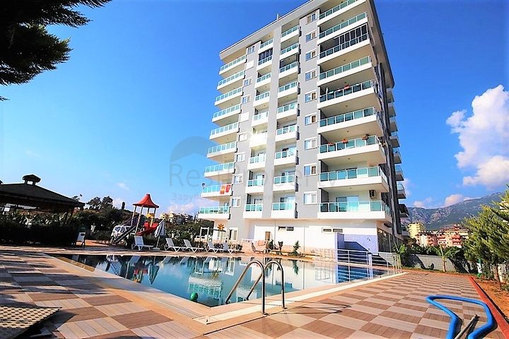 Двухуровневые апартаменты 4+1 в Махмутларе