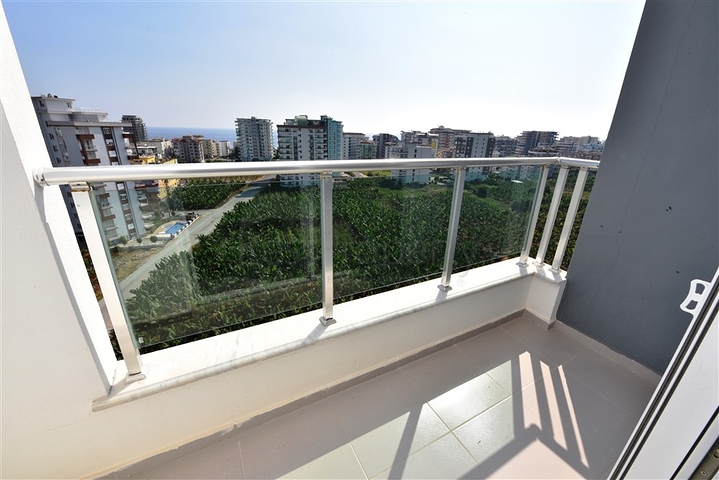 Двухуровневые апартаменты 4+1 в Махмутларе