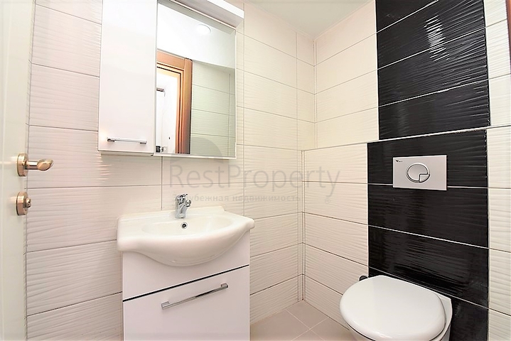 Двухуровневые апартаменты 4+1 в Махмутларе