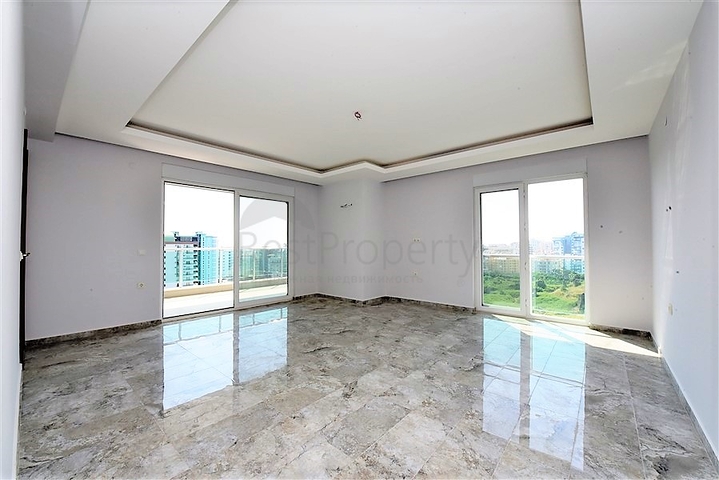 Двухуровневые апартаменты 4+1 в Махмутларе