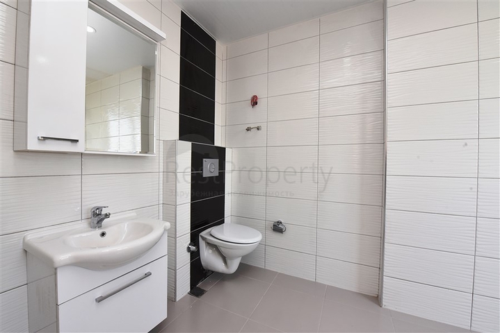 Двухуровневые апартаменты 4+1 в Махмутларе