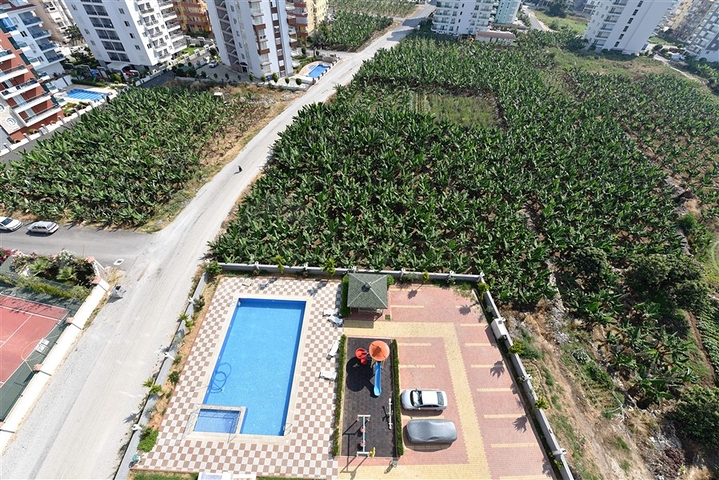 Двухуровневые апартаменты 4+1 в Махмутларе