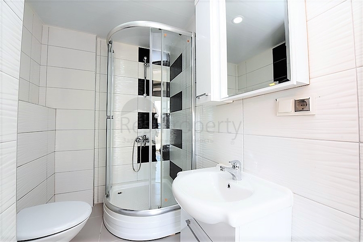 Двухуровневые апартаменты 4+1 в Махмутларе