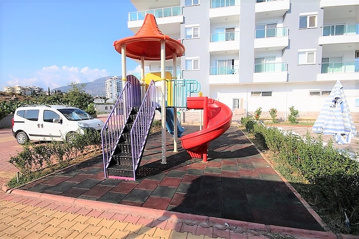 Двухуровневые апартаменты 4+1 в Махмутларе