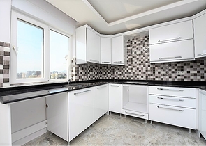 Двухуровневые апартаменты 4+1 в Махмутларе