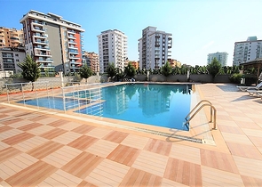 Двухуровневые апартаменты 4+1 в Махмутларе