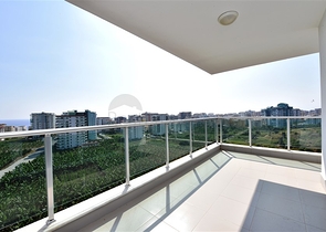 Двухуровневые апартаменты 4+1 в Махмутларе