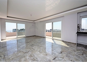 Двухуровневые апартаменты 4+1 в Махмутларе