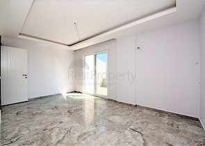 Двухуровневые апартаменты 4+1 в Махмутларе