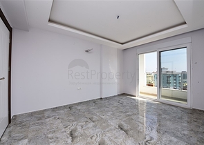 Двухуровневые апартаменты 4+1 в Махмутларе