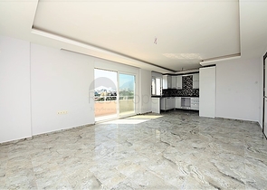 Двухуровневые апартаменты 4+1 в Махмутларе