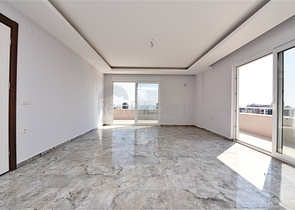 Двухуровневые апартаменты 4+1 в Махмутларе