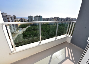 Двухуровневые апартаменты 4+1 в Махмутларе