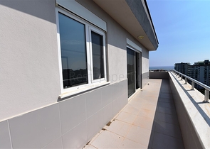 Двухуровневые апартаменты 4+1 в Махмутларе