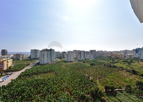 Двухуровневые апартаменты 4+1 в Махмутларе