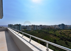 Двухуровневые апартаменты 4+1 в Махмутларе