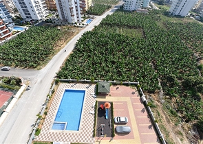 Двухуровневые апартаменты 4+1 в Махмутларе