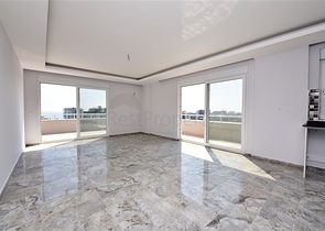 Двухуровневые апартаменты 4+1 в Махмутларе