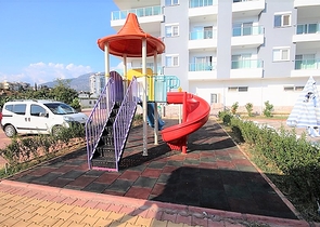 Двухуровневые апартаменты 4+1 в Махмутларе