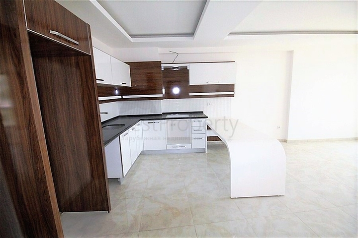 Апартаменты 1+1 в новом комплексе Махмутлара