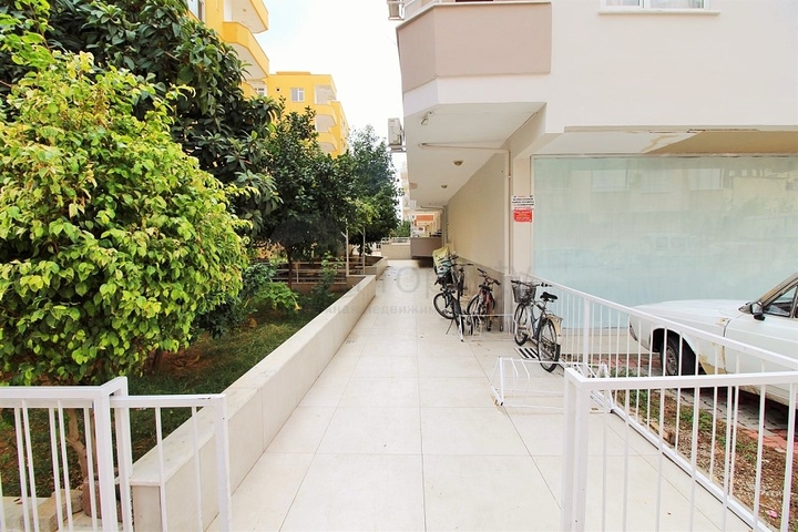 Трехкомнатная квартира в районе Махмутлар