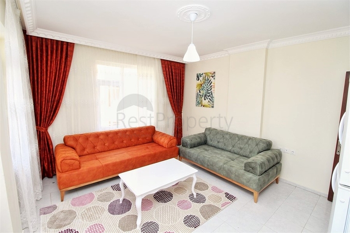 Трехкомнатная квартира в районе Махмутлар