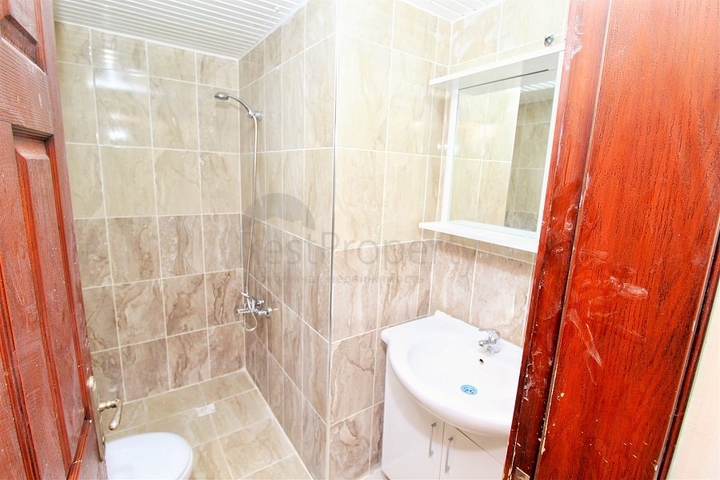 Трехкомнатная квартира в районе Махмутлар