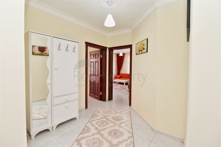 Трехкомнатная квартира в районе Махмутлар