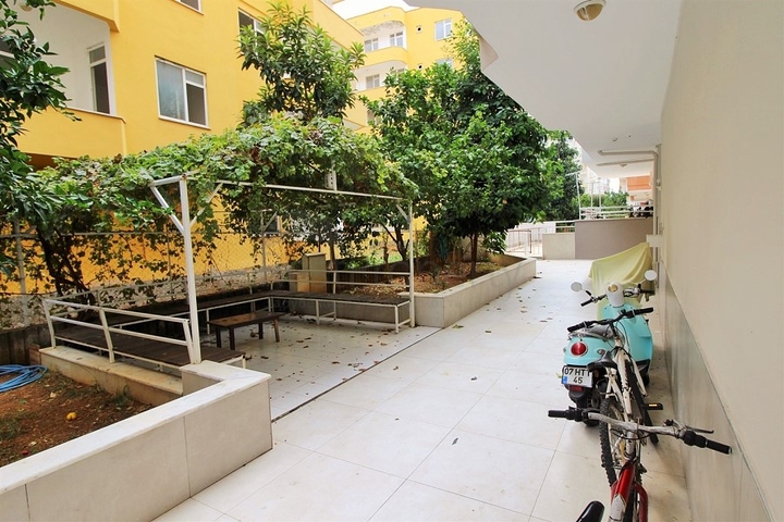 Трехкомнатная квартира в районе Махмутлар