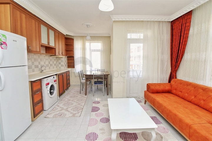 Трехкомнатная квартира в районе Махмутлар