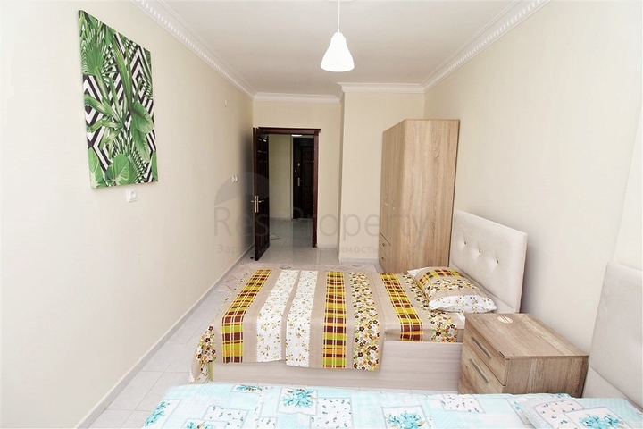 Трехкомнатная квартира в районе Махмутлар