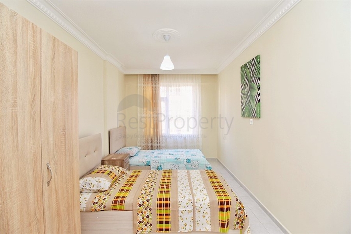 Трехкомнатная квартира в районе Махмутлар