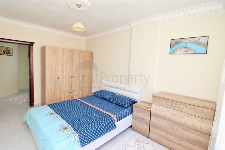 Трехкомнатная квартира в районе Махмутлар