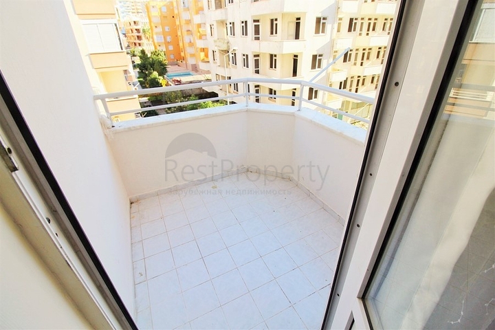 Трехкомнатная квартира в районе Махмутлар