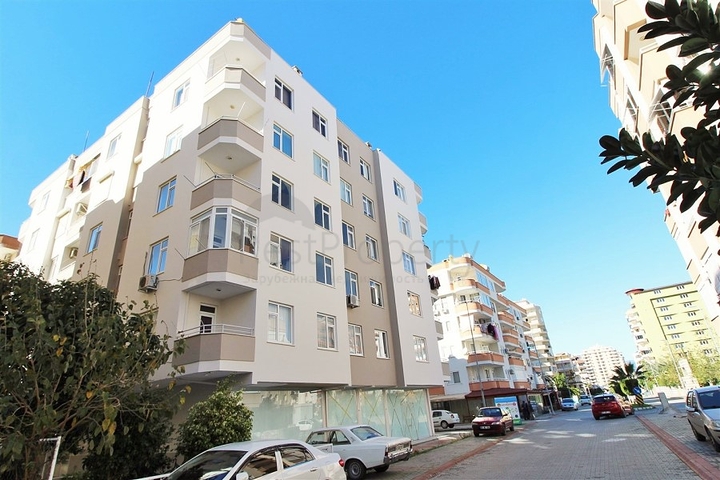 Трехкомнатная квартира в районе Махмутлар