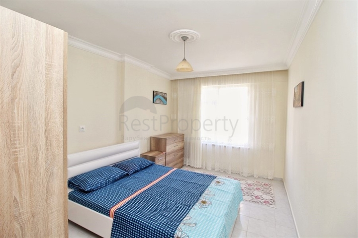 Трехкомнатная квартира в районе Махмутлар