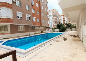 Трехкомнатная квартира в районе Махмутлар