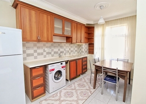 Трехкомнатная квартира в районе Махмутлар