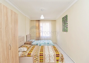 Трехкомнатная квартира в районе Махмутлар