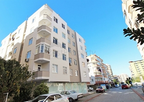 Трехкомнатная квартира в районе Махмутлар